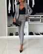 Women's double-breasted trouser suit with tailored blazer, lapels and matching ankle-length trousers