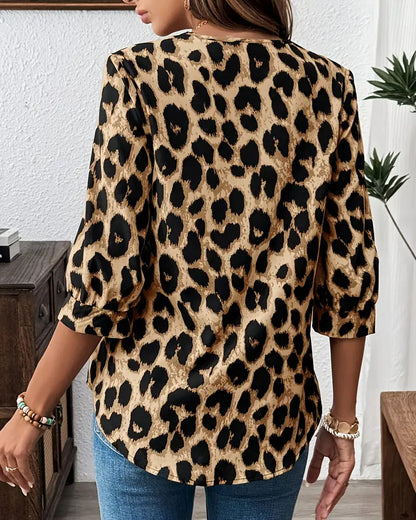 Women's leopard print blouse with V-neck collar and 3/4 sleeves