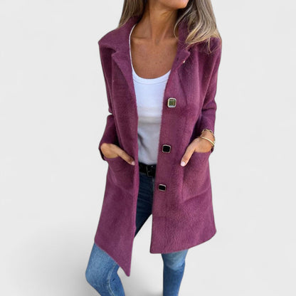 Women's longline textured coat with notched lapels, buttons and front pockets
