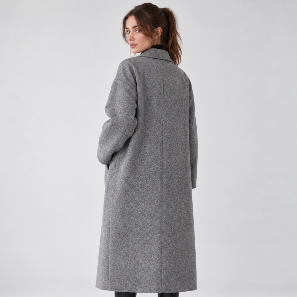 Women's long geometric patterned coat with notched lapels and button fastening