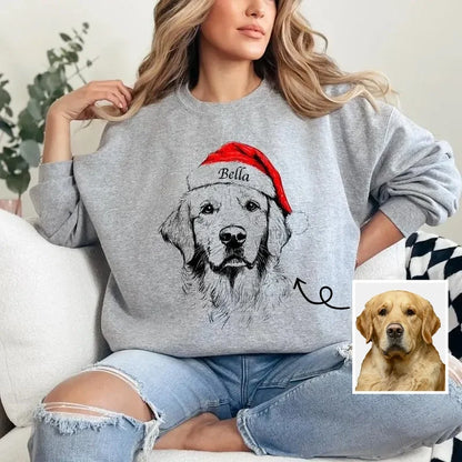 Unisex grey Christmas sweatshirt with dog Santa hat design, shown on family members around decorated kitchen