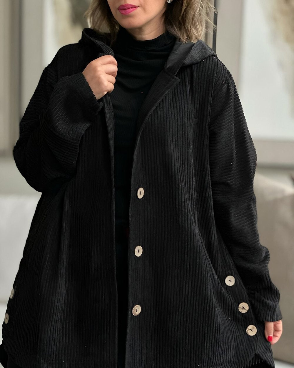 Women's hooded textured jacket with long sleeves and button front