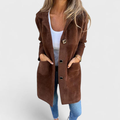 Women's longline textured coat with notched lapels, buttons and front pockets