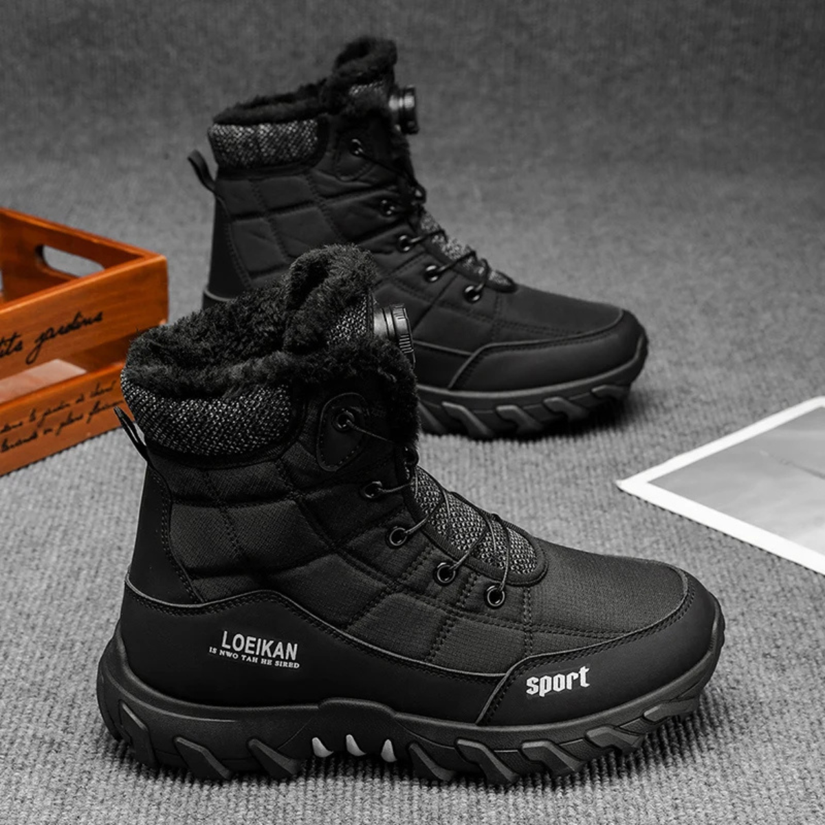 Men's mid-cut snow boots with fur-trimmed collar, lace-up front and rugged treaded sole