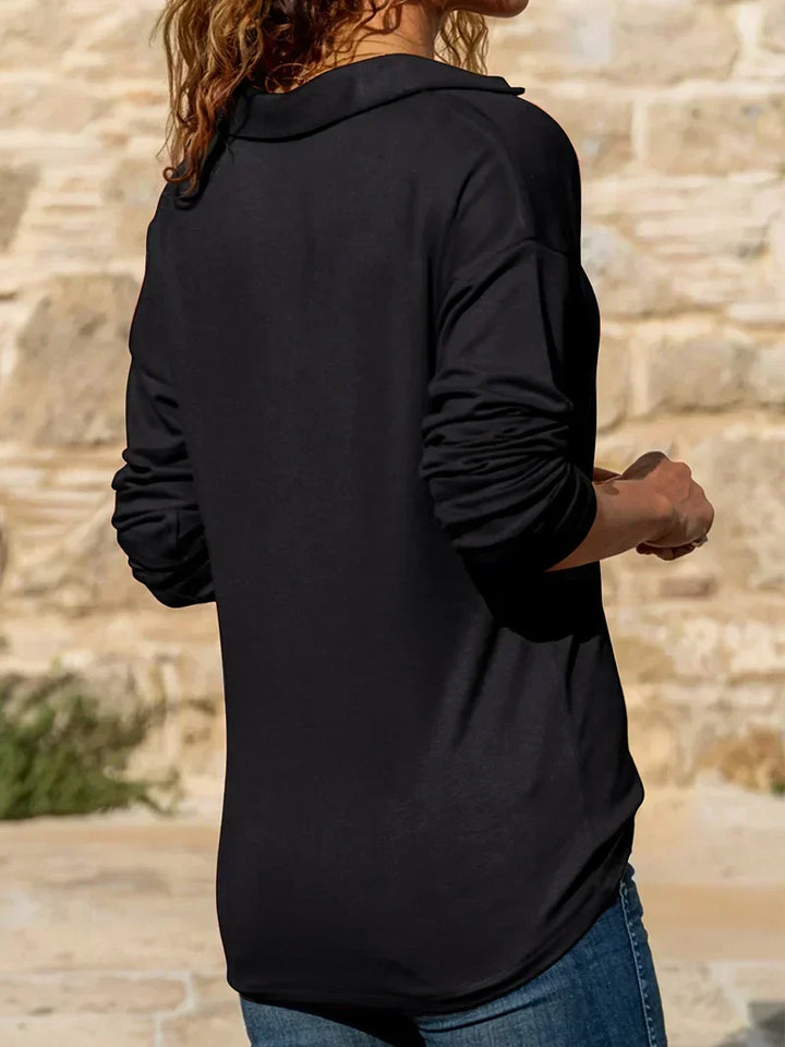 Women's collared quarter zip sweater with long sleeves