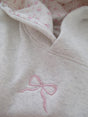 Light gray oversized hoodie with pink bow embroidery and floral hood lining