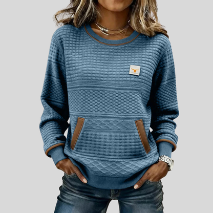 Women's textured crew neck sweatshirt with long sleeves and front kangaroo pocket