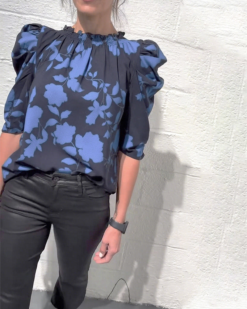Women's floral blouse with ruched round neckline and 3/4 puff sleeves