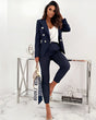 Women's double-breasted trouser suit with tailored blazer, lapels and matching ankle-length trousers