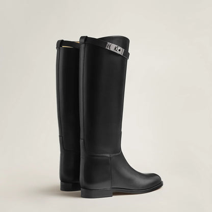 Women's tall riding boots with round toes, low heels and upper strap detail