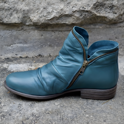 Ankle boots with diagonal zipper, rounded toe and low heel