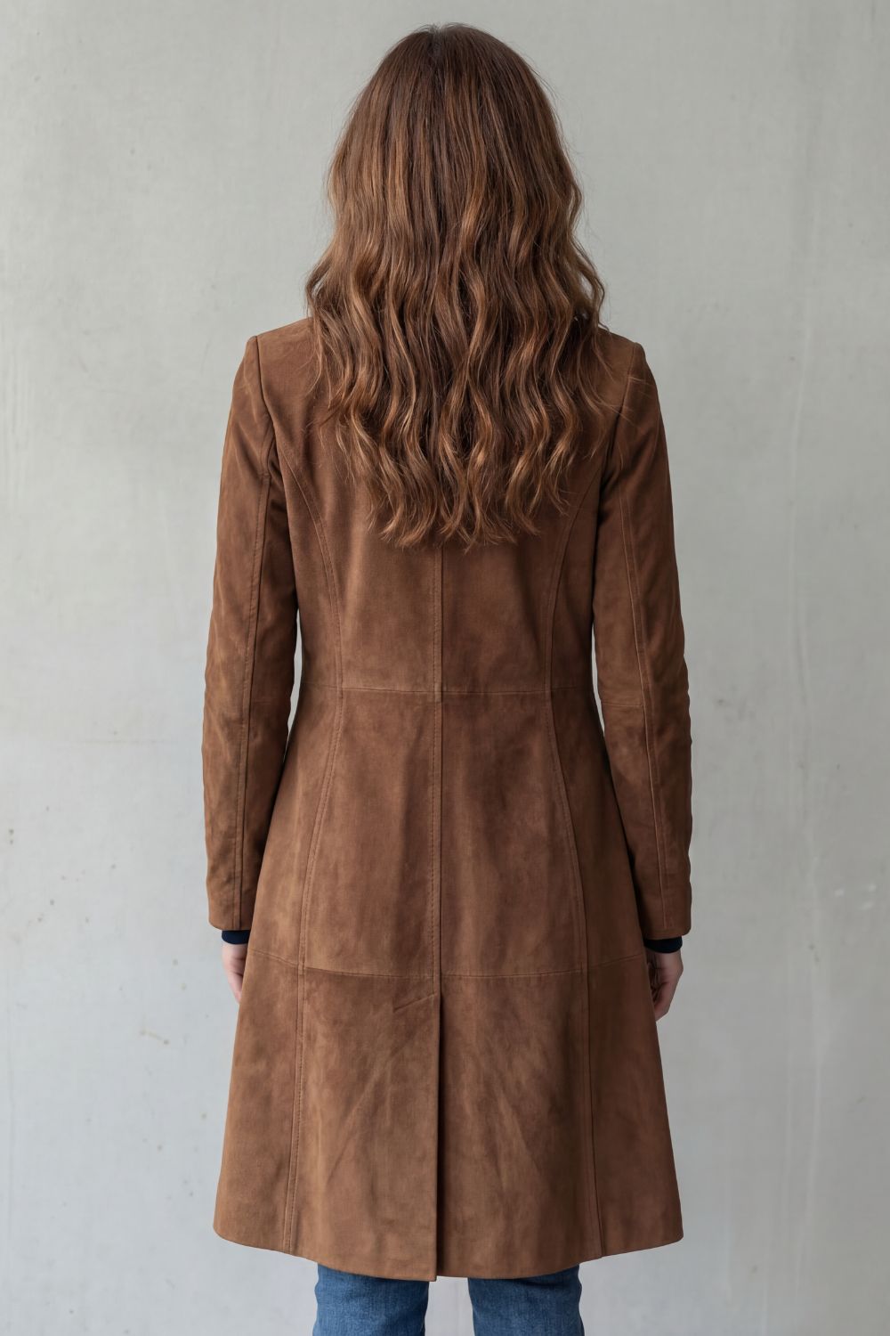 Women's longline coat with notched lapels, button front and hip pockets