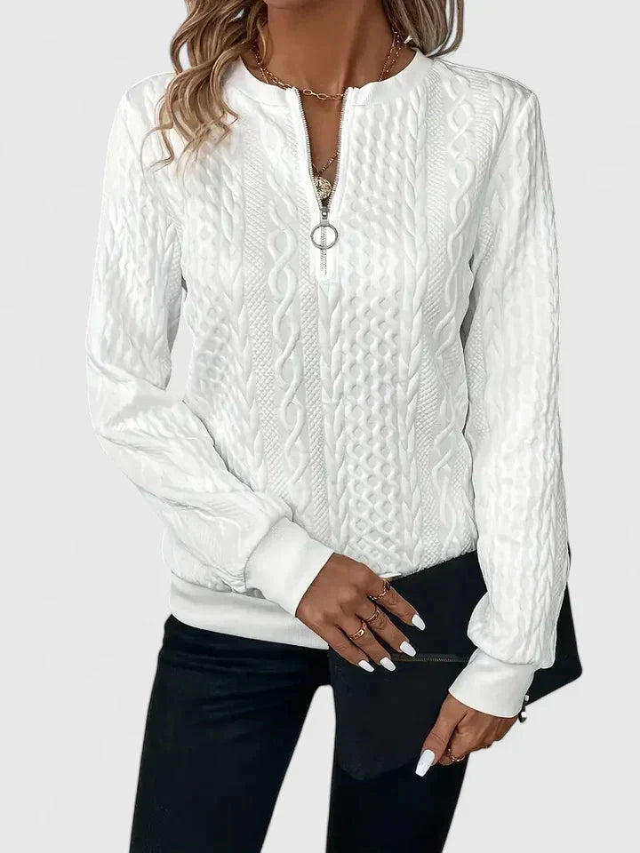 Women's textured cable knit sweater with zip neckline and ribbed trims