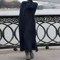 Women's long sleeve high neck maxi dress with side pockets and ankle-length hem