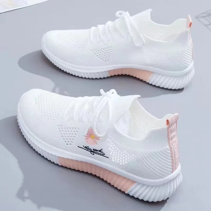 Women's floral lace-up sneakers with ribbed soles