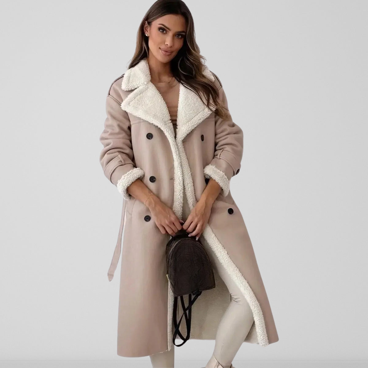 Women's long coat with contrasting shearling-style trim, lapel collar and double-breasted buttons