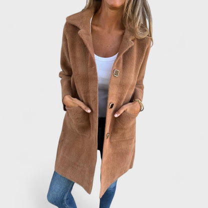Women's longline textured coat with notched lapels, buttons and front pockets