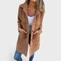 Women's longline textured coat with notched lapels, buttons and front pockets