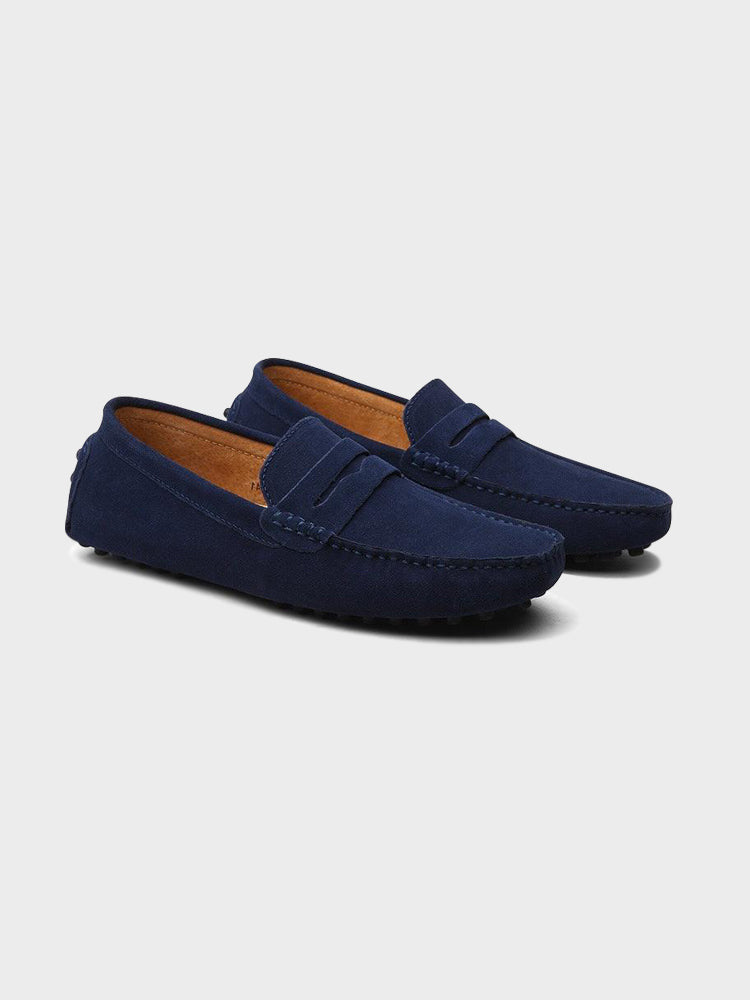 Suede boat loafers with moc stitching and penny-style straps