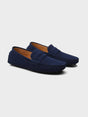 Suede boat loafers with moc stitching and penny-style straps