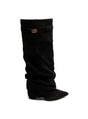 Black women's slouch knee-high boots with pointed toes and buckle details