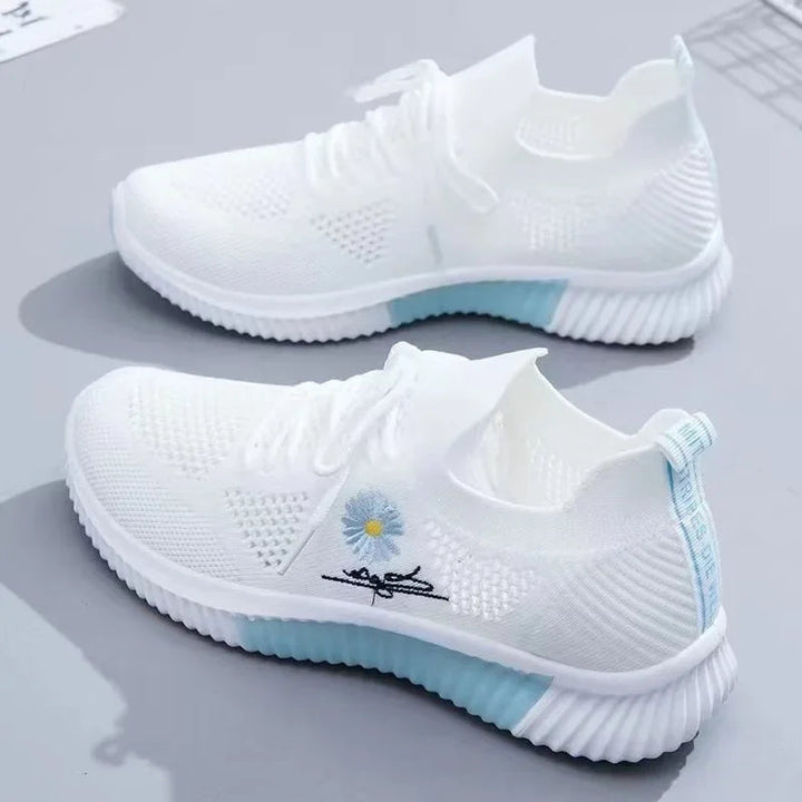 Women's floral lace-up sneakers with ribbed soles