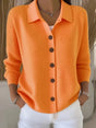 Women's textured button-front cardigan with pointed collar and long sleeves