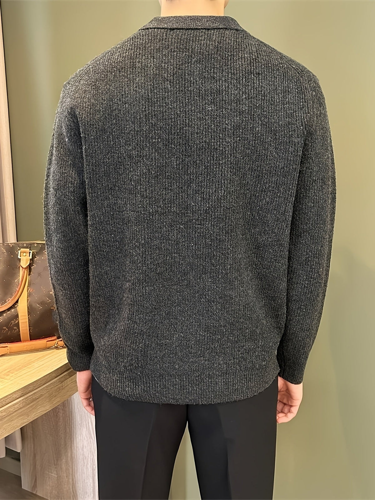 Men's ribbed knit polo sweater with point collar and long sleeves