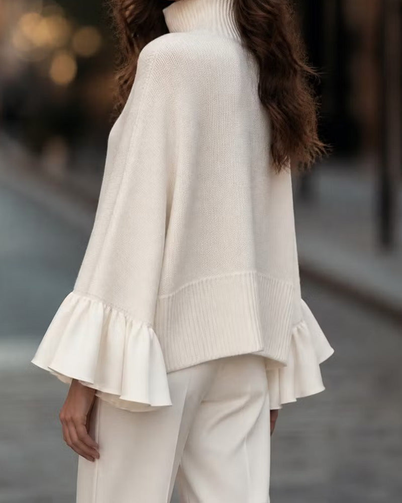 Women's cream turtleneck sweater with long ruffle sleeves and ribbed hem