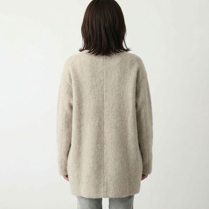 Women's long textured button front cardigan with patch pockets