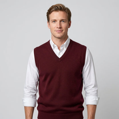 Men's sleeveless V-neck sweater vest layered over a collared shirt