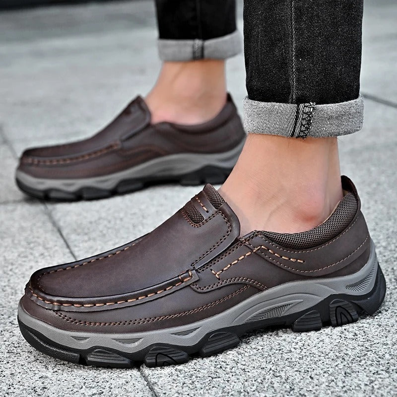 Men's casual moc toe loafers with stitched detailing and textured soles