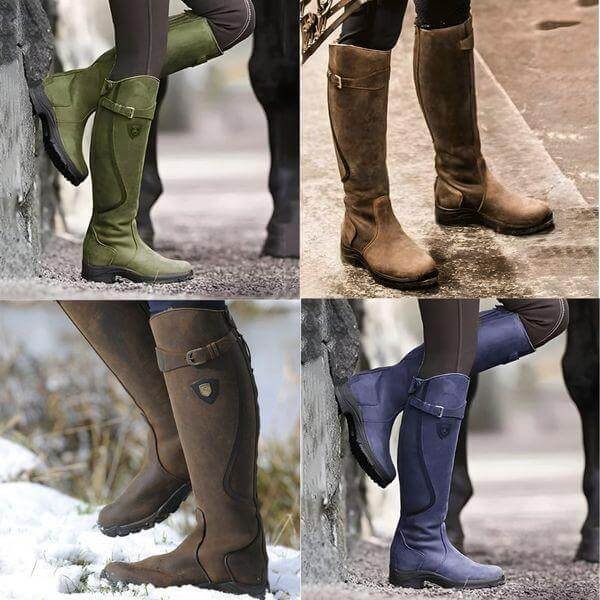 Women's tall riding boots with buckle straps, rounded toes and low heels