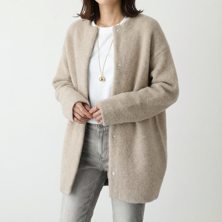 Women's long textured button front cardigan with patch pockets
