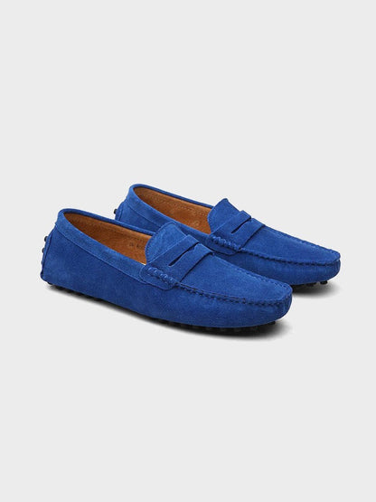Suede boat loafers with moc stitching and penny-style straps