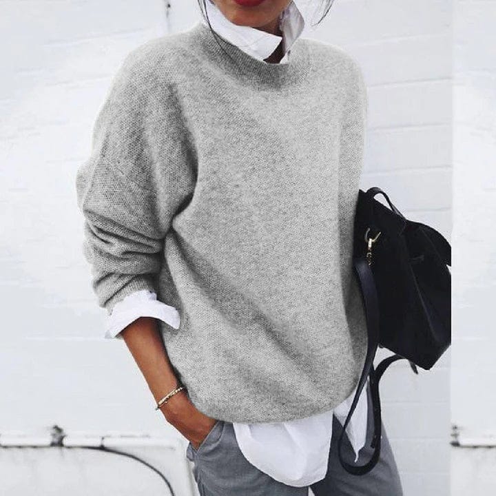Women's crew neck knit sweater with long sleeves and ribbed trims