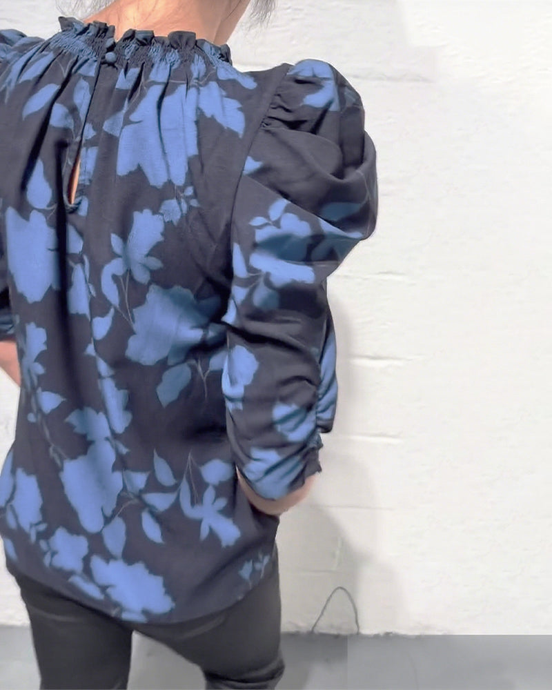 Women's floral blouse with ruched round neckline and 3/4 puff sleeves