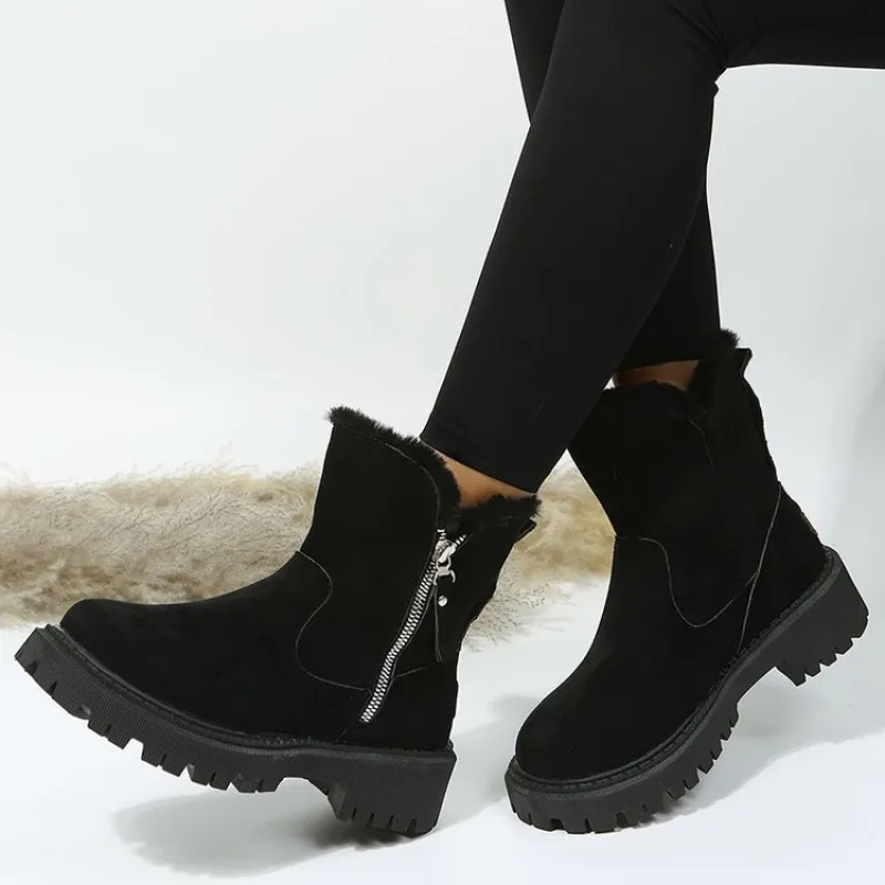 Women's ankle boots with plush fur cuffs, side zippers and lug soles