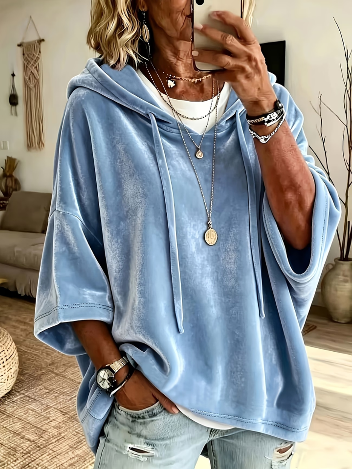 Women's oversized hoodie with drawstring hood and wide sleeves