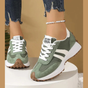 Women's retro lace-up sneakers with striped side panels and flat textured soles