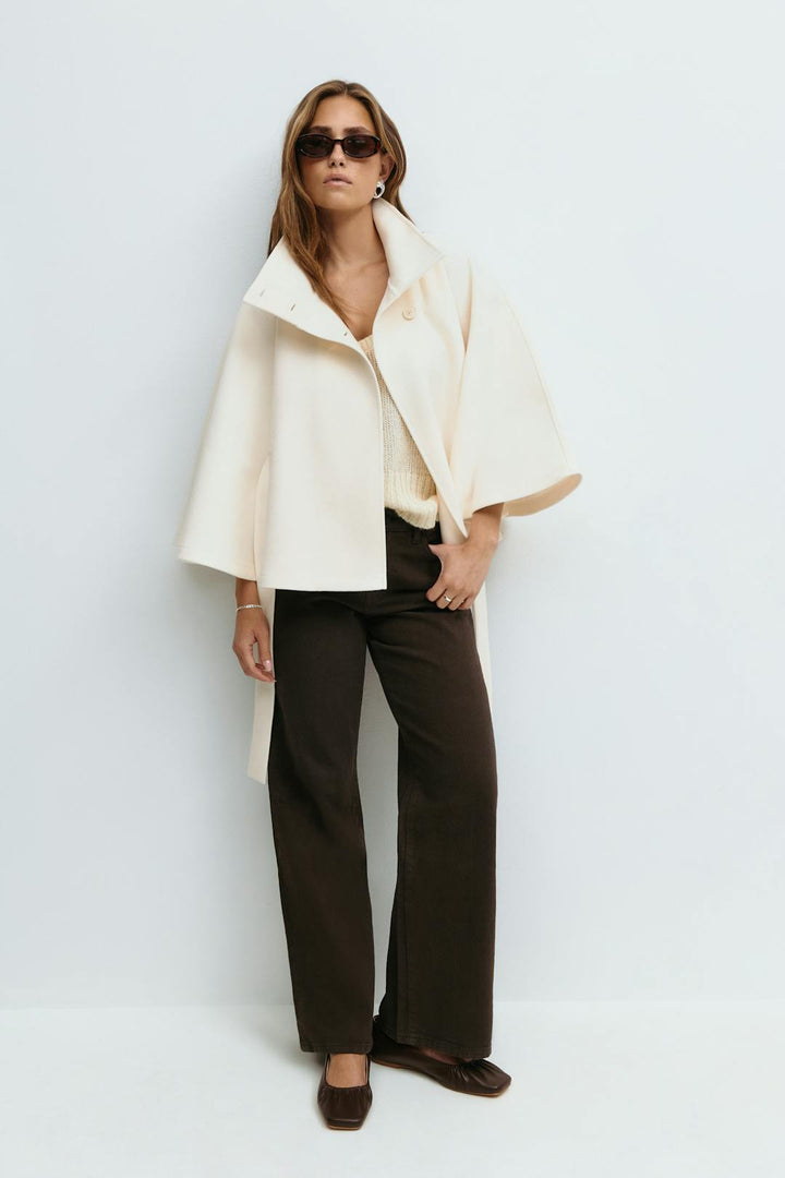 Women's cape coat with high collar and tie belt