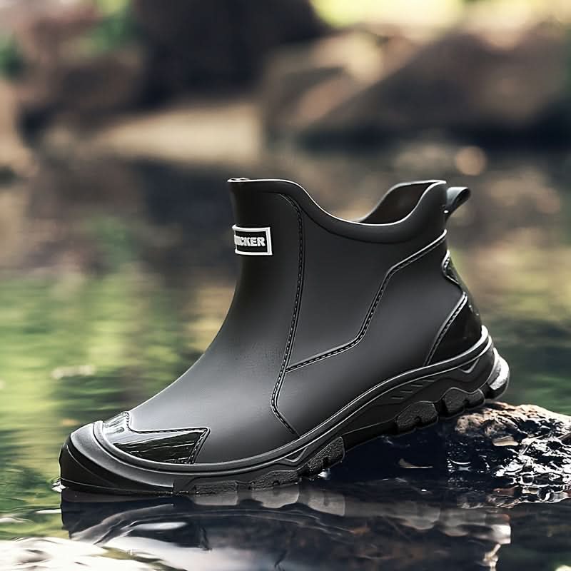 Ankle boots with pull tabs, stitched panels and lug soles