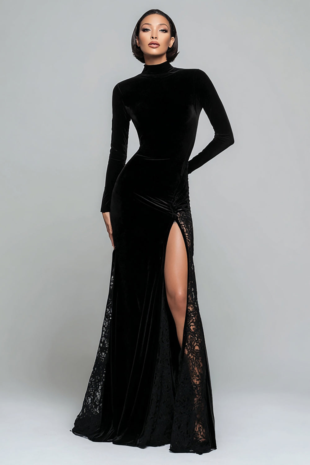 Women's black velvet mermaid maxi dress with high neck, long sleeves, lace panels and side slit