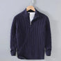 Men's cable knit quarter-zip sweater with mock neck and long sleeves