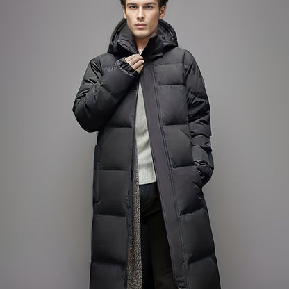 Men's black long hooded puffer coat with quilted panels and zip front