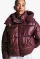 Women's burgundy quilted hooded puffer jacket with snap front and front pockets