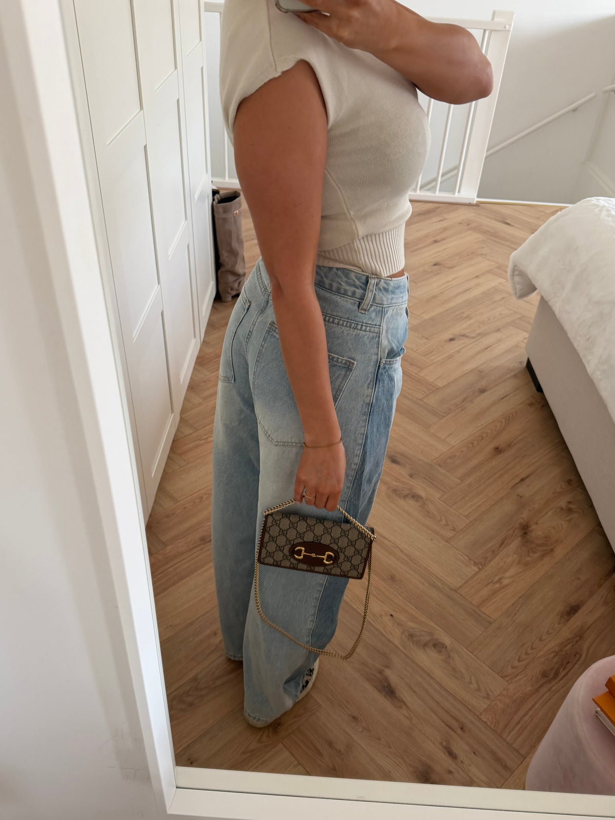 Women's light blue wide-leg jeans with contrast denim panels