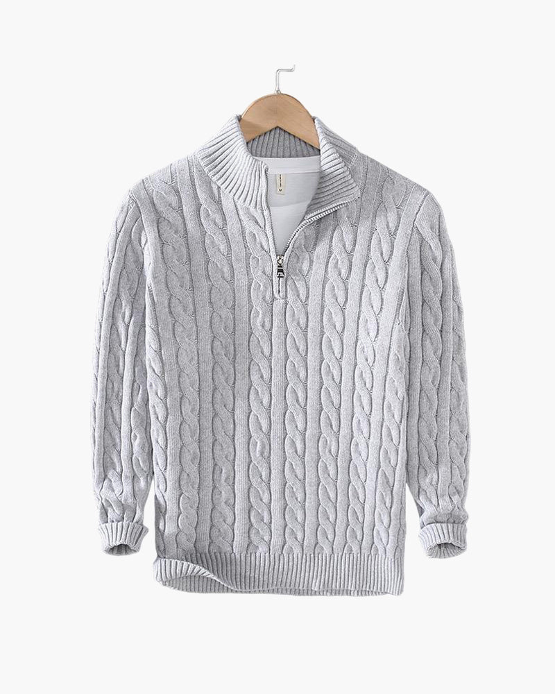 Cable knit sweater with mock collar, quarter zip and ribbed trims