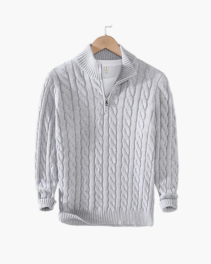 Cable knit sweater with mock collar, quarter zip and ribbed trims