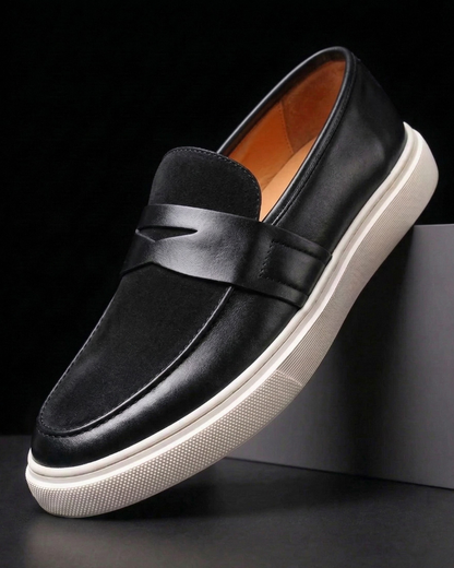 Slip-on penny loafer with textured vamp panel and flat contrast sole